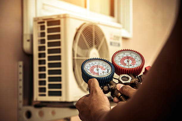 Professional Hvac technician working in Mount Rainier, MD